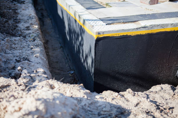 Professional Emergency Waterproofing technician working in Foley, AL